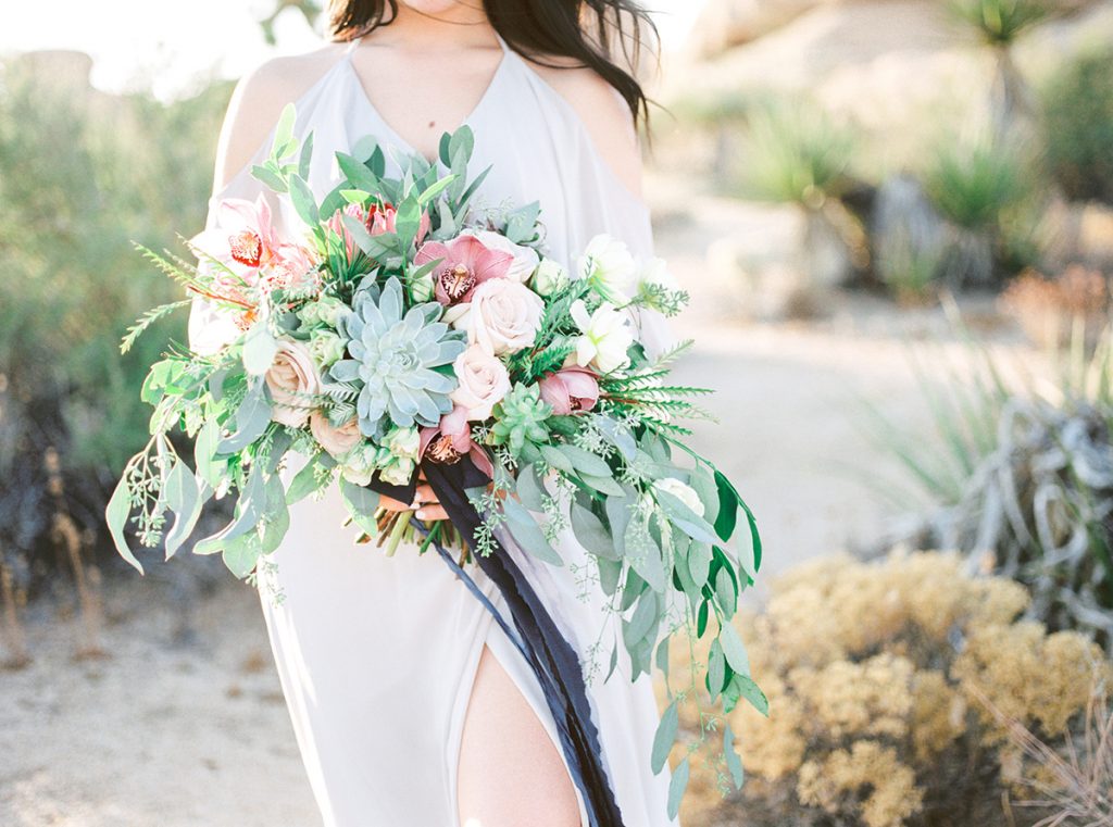 Bride holds bouquet at Joshua Tree Elopement